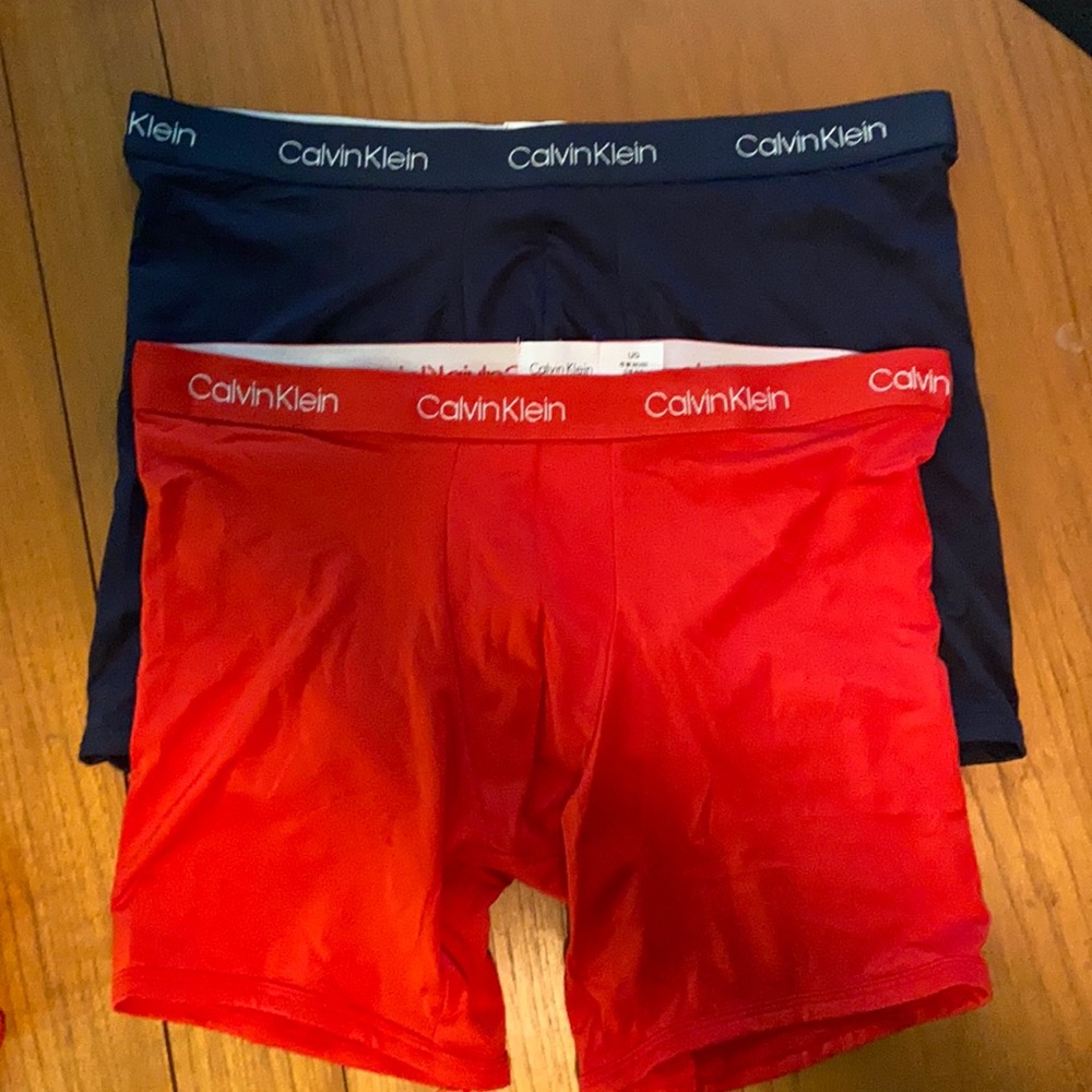 Calvin Kline briefs. 2 pair. Red and black